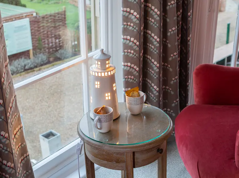 Deluxe Sea View room, coffee table and view from the room